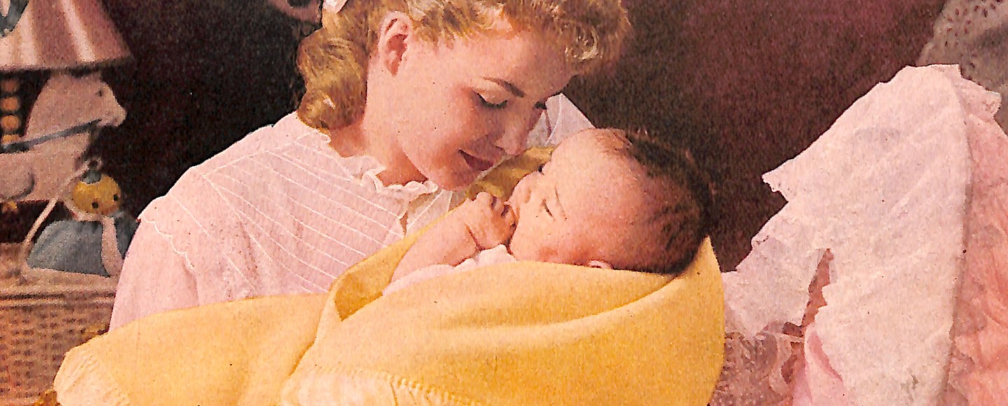 Mom and Baby in mid-century nursery