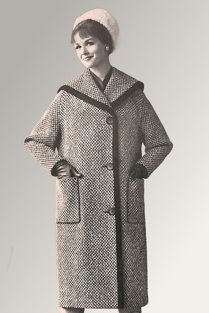 Mid-century woman wearing tweed coat and gloves.