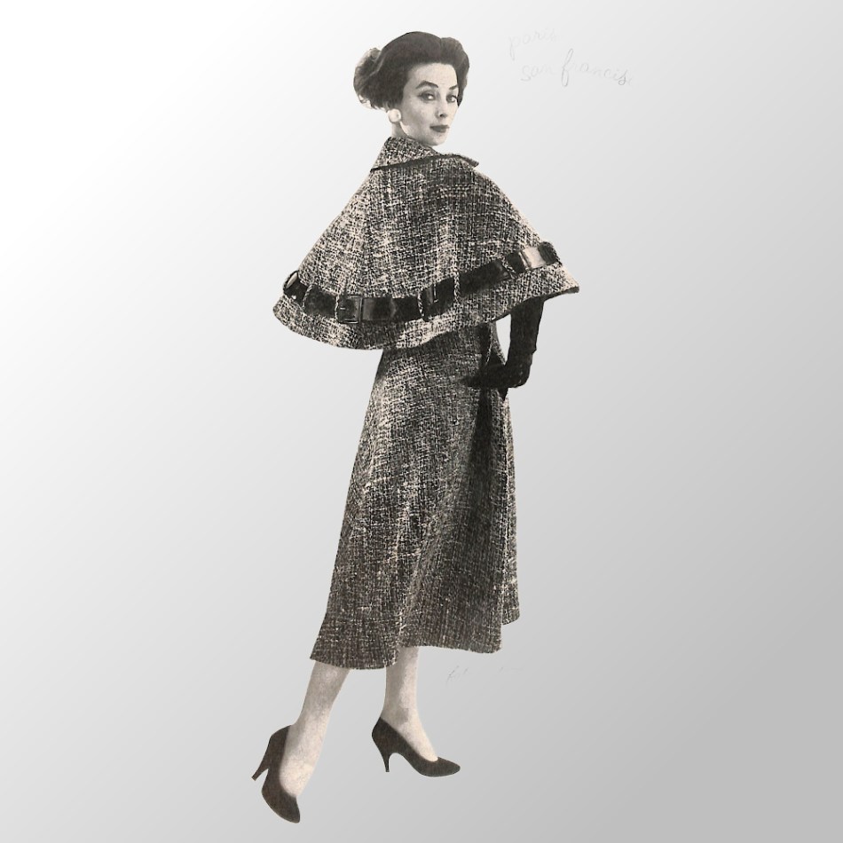 Woman wearing tweed cape coat from 1957