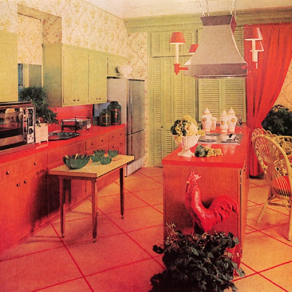 1960s kitchen in avocado green, cherry red, and wood.